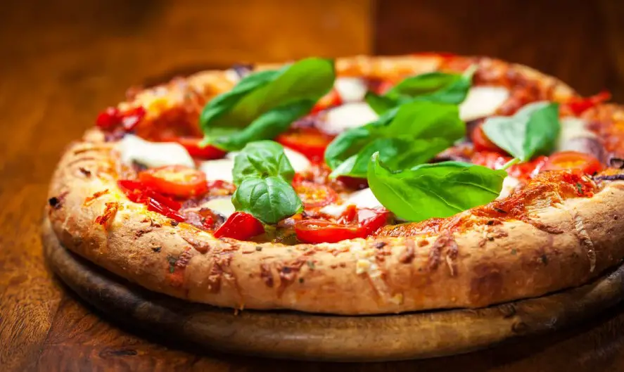 when to put basil on pizza 